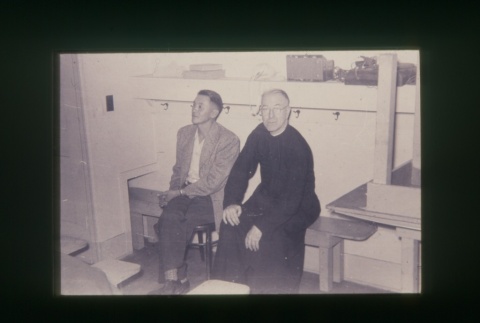(Slide) - Image of priest and man seated (ddr-densho-330-199-master-1014f79871)