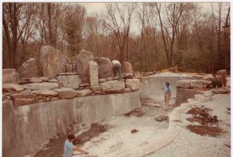 Cleaning up pool bottom (ddr-densho-377-1847)