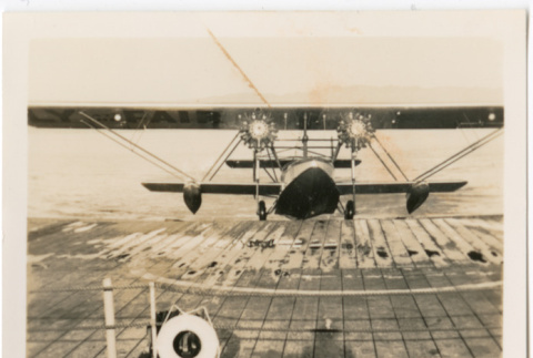 Small float plane taking off (ddr-densho-426-1647)