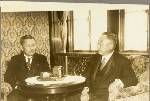 Two Japanese officials in a meeting (ddr-njpa-13-1228)