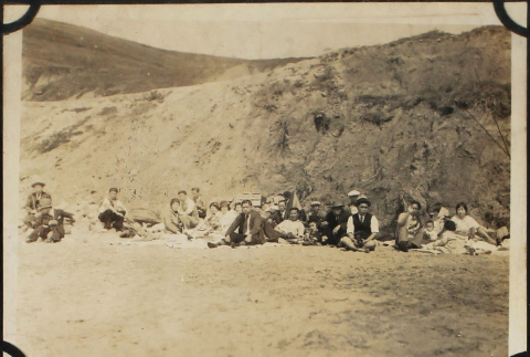 Group at a picnic on the beach (ddr-densho-423-521)