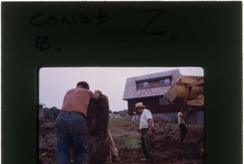 Men working on rock garden construction (ddr-densho-377-902)