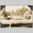 Man and woman in rowboat (ddr-densho-383-207)