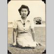Woman sitting on lawn (ddr-densho-587-71)