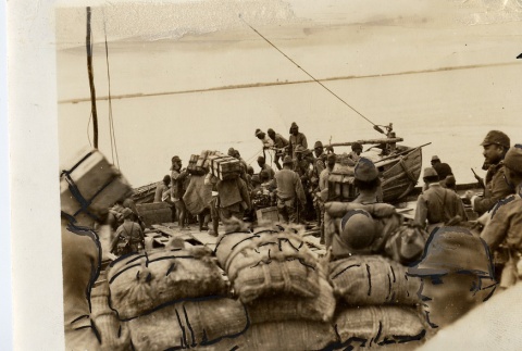 Soldiers loading boats (ddr-njpa-6-95)