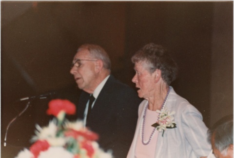 The Woodwards speaking at the 1986 JACL National Convention kickoff dinner (ddr-densho-10-31)