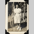 Woman standing by small trees (ddr-densho-587-19)
