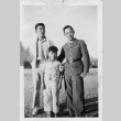 Two Nisei men and a boy in a concentration camp (ddr-densho-154-3)