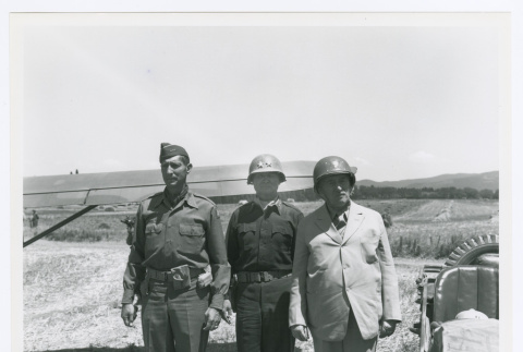 Lt. Gen. Mark W. Clark, Maj. Gen. Willis D. Crittenberger, and Secretary of War Henry L. Stimson at a cub field in the 34th Division in Italy (ddr-densho-1007-69)
