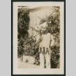 Boy in costume playing trumpet (front) (ddr-densho-378-451)