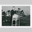 Serviceperson speaking at podium (ddr-densho-1007-65)
