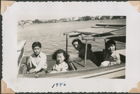 A family in a boat (ddr-densho-321-155)