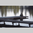 Campers sitting on the dock (ddr-densho-336-1752)