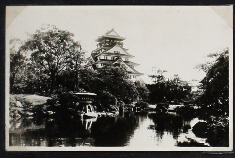 Building surrounded by a pond and garden (ddr-densho-404-142)