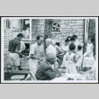 Group at picnic buffet table (ddr-densho-293-178)