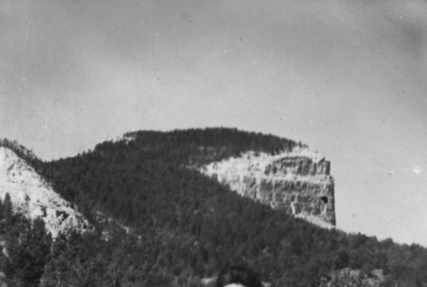 Man posing in front of Heart Mountain (ddr-ajah-2-920)