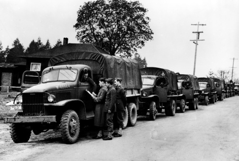 Army trucks preparing for mass removal (ddr-densho-34-55)
