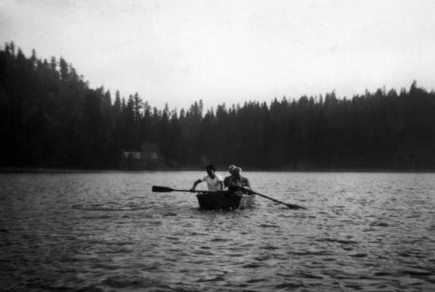 Campers in a row boat on Lake Sequoia (ddr-densho-336-24)