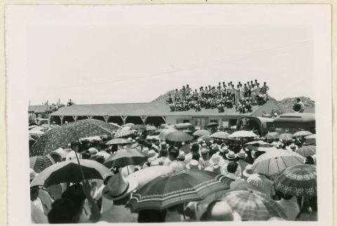 Crowd watches from a roof (ddr-densho-37-1444)