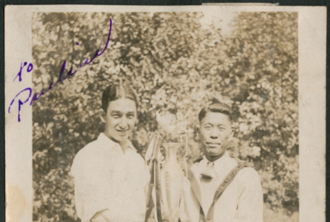 Two men with trophy (ddr-densho-316-310)
