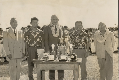 Organizers of an Oahu AJA baseball league posing with trophies (ddr-njpa-2-780)
