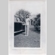Young woman in yard (ddr-densho-313-73)