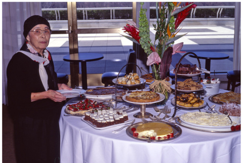 Meriko at a buffet (ddr-densho-494-32)