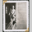 Man standing on loading dock (ddr-densho-434-376)