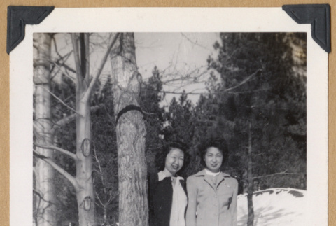 Two women pose in the snow (ddr-densho-542-322)