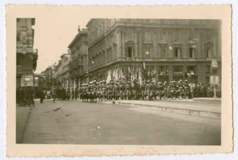 Soldiers marching in city street (ddr-densho-368-94)