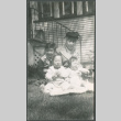 Woman with three children (ddr-densho-523-182)