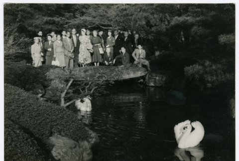 Mitsuye Yabe and Tour Group Posing by Pond (ddr-ohs-1-132)