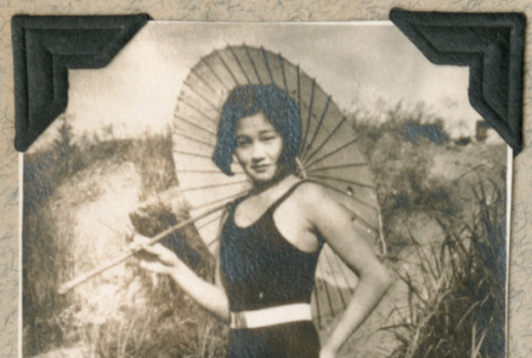 Hatsue Aoki in swimsuit with parasol (ddr-densho-383-46)