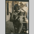 woman and baby in rocking chair (ddr-densho-378-701)