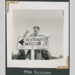 George Nelidov by sign near Russian River (ddr-densho-434-107)