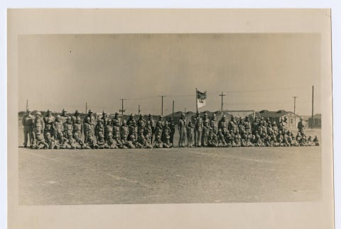 Group photo of Boy Scouts in front of barracks (ddr-densho-223-48)