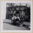 William Shiomi with puppy (ddr-densho-522-220)