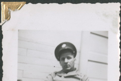 Man in uniform sitting (ddr-densho-434-167)