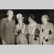 Gilbert and Minnie Bowles and two women wearing leis (ddr-njpa-2-81)