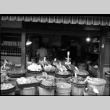 Store with bins of produce in front (ddr-densho-426-2348)