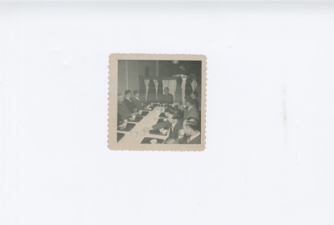 (Photograph) - Image of men in suits seated at table drinking tea (ddr-densho-330-278-master-db9ce8979e)
