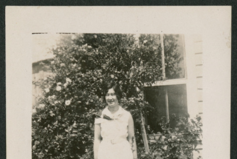 woman in a yard (ddr-densho-378-821)
