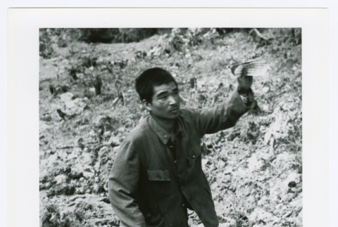 Man walking with stick (ddr-densho-1007-368)
