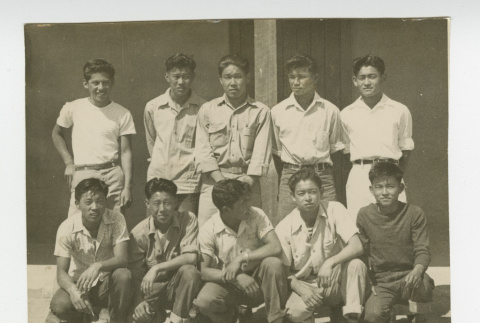 Young Nisei men in front of barrack (ddr-csujad-44-16)