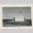 Gila River monument with American flag (ddr-densho-37-1464)