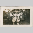Family photo standing by car (ddr-densho-316-400)