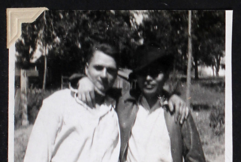 Two men pose for a photograph (ddr-densho-404-74)