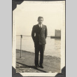 Man standing on wharf (ddr-densho-326-554)