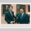 Frank Sato with former president Ronald Reagan (ddr-densho-345-26)