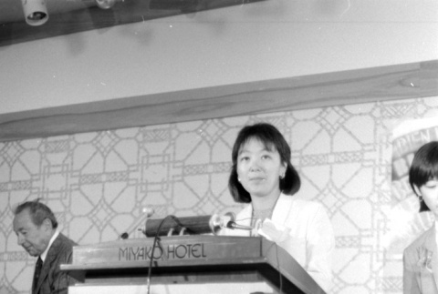 Woman at podium (ddr-densho-1007-509)